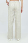 A pair of beige wide-leg trousers with a mid-rise waist, front buttons, and a relaxed fit. The trousers are fully lined and have a hook and bar closure at the waistband with an adjustable elastic belt.
