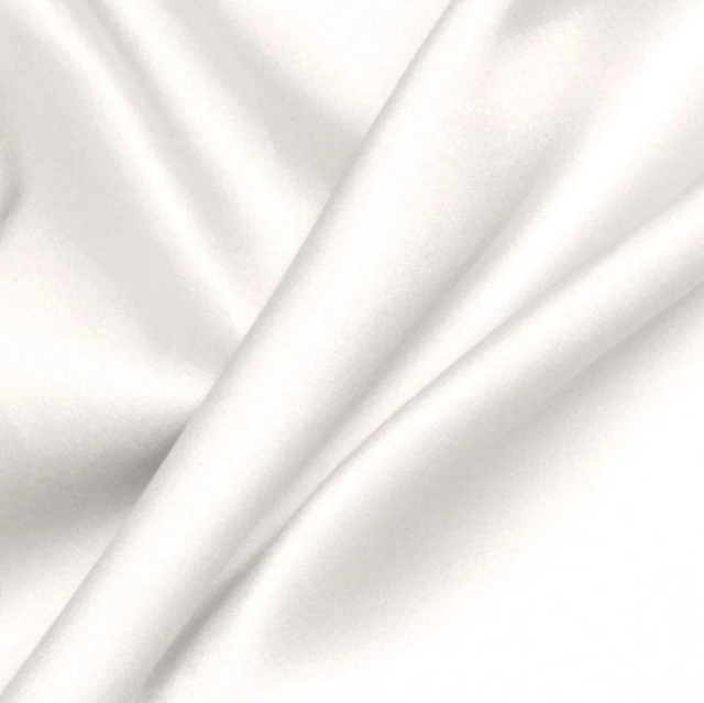 White satin fabric with elegant draped folds and a soft sheen.