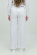 A pair of white wide-leg trousers with a mid-rise waist, front buttons, and a relaxed fit. The trousers are fully lined and have a hook and bar closure at the waistband with an adjustable elastic belt.