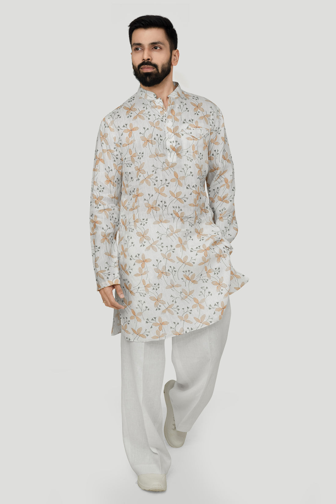 Indian ethnic white printed kurta hanging
