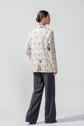 Back view of the Jam women's hemp boyfriend blazer with its all-over printed design and back vents