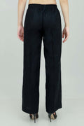 A pair of black wide-leg trousers with a mid-rise waist, front buttons, and a relaxed fit. The trousers are fully lined and have a hook and bar closure at the waistband with an adjustable elastic belt.