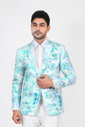 Man wearing a light blue floral blazer over a white shirt on a white background