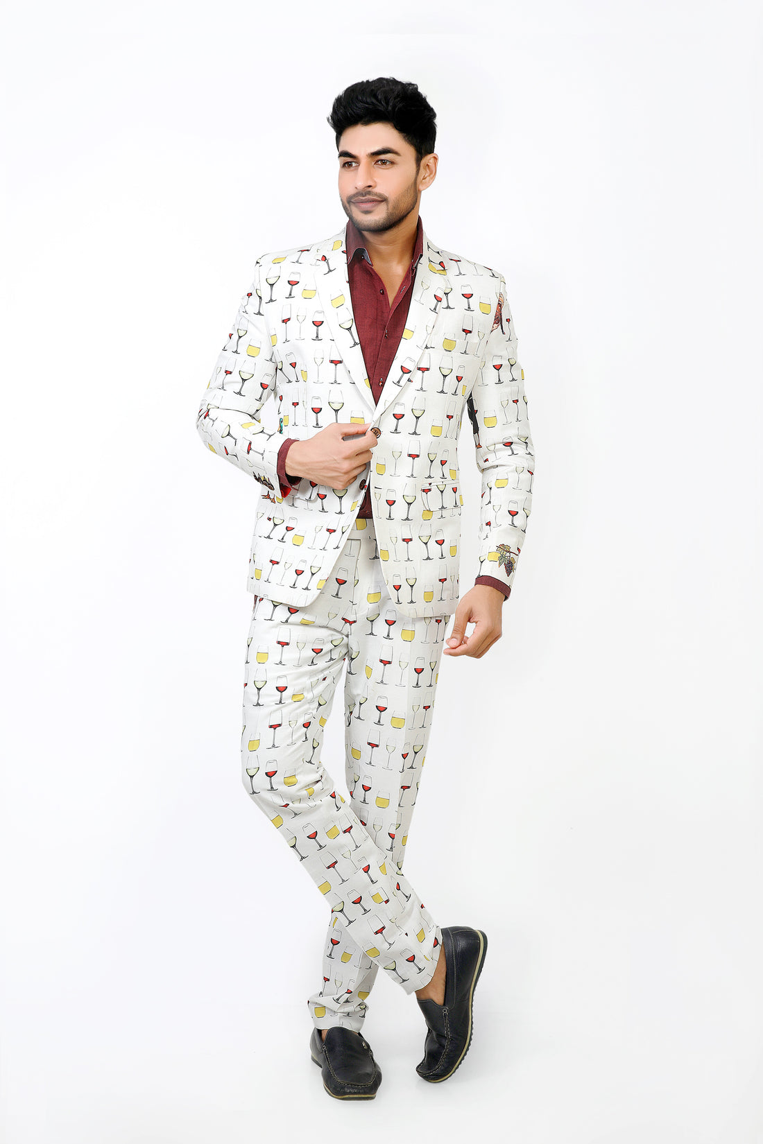 Man wearing a patterned suit on a white background