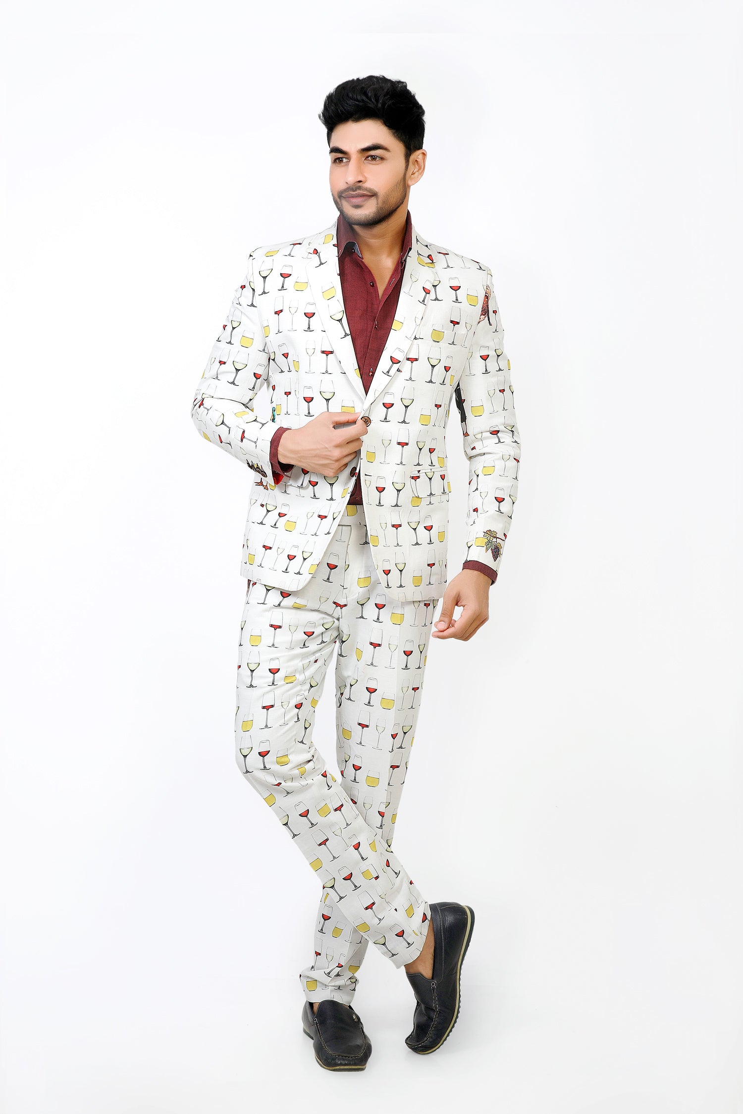 Man wearing a patterned suit on a white background