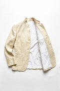 Assam Muga silk jacket laid open to show the cotton satin lining and inner pocket