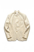Assam women's Muga silk jacket in natural gold with mandarin collar, three buttons and patch pockets, flat lay