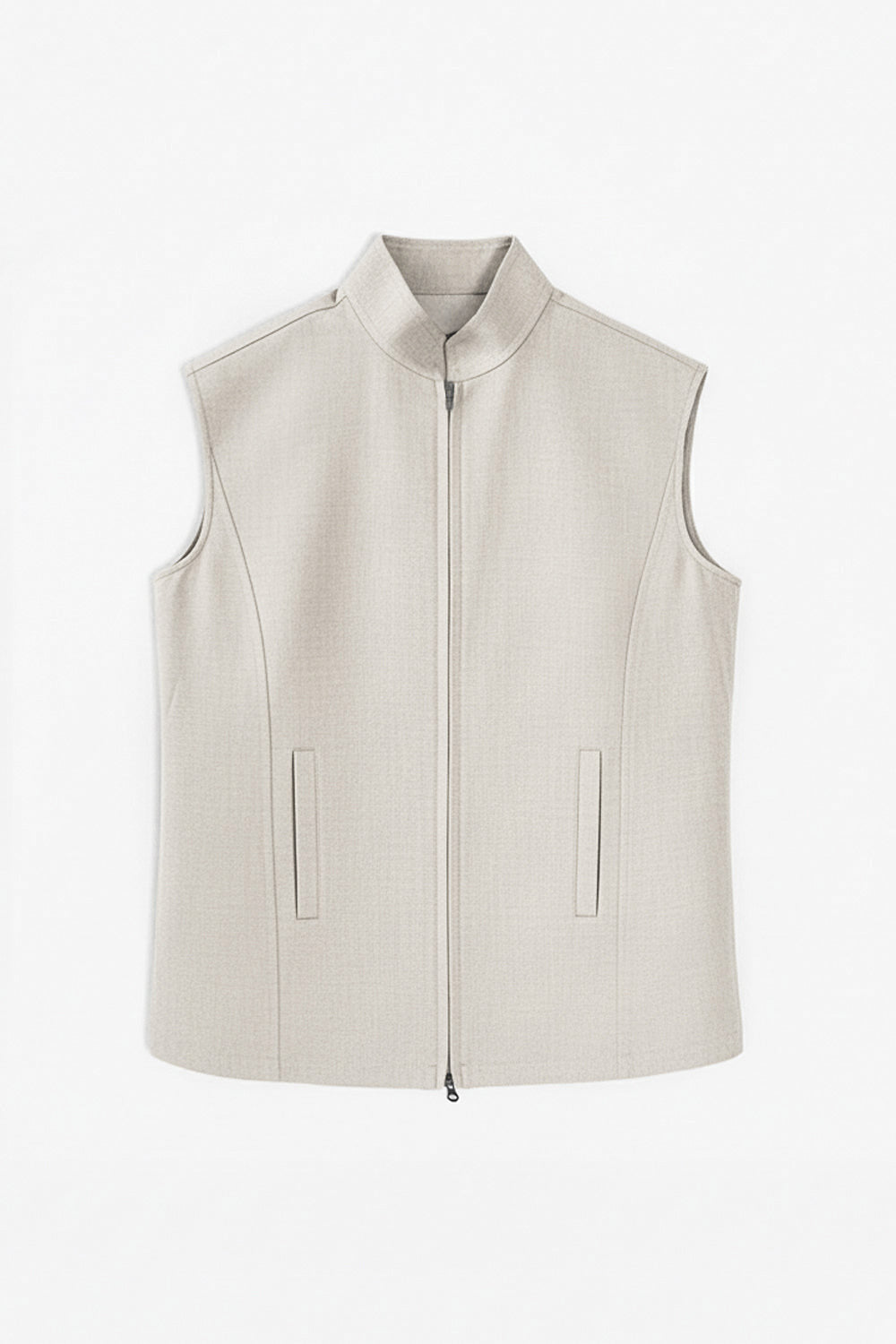 A man and a woman modeling coordinated apparel against a plain light gray studio background. The woman wears a light beige tailored slinen vest with a collared shirt, and the man wears a black sleeveless linen vest over a black long-sleeve top.