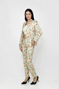 Woman wearing a floral suit on a white background