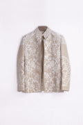A beige and white embroidered linen blazer-style jacket with a mandarin collar, displayed flat against a plain white background.