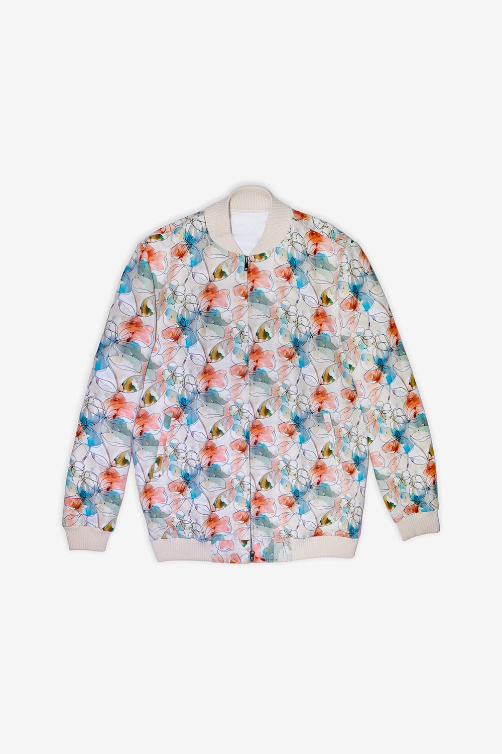 A man modeling a white bomber hemp jacket with a colorful floral print, worn over a white t-shirt and blue jeans, against a plain white studio background.