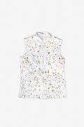 A sleeveless white collared shirt with a small gold and yellow floral print, displayed flat against a light gray background.