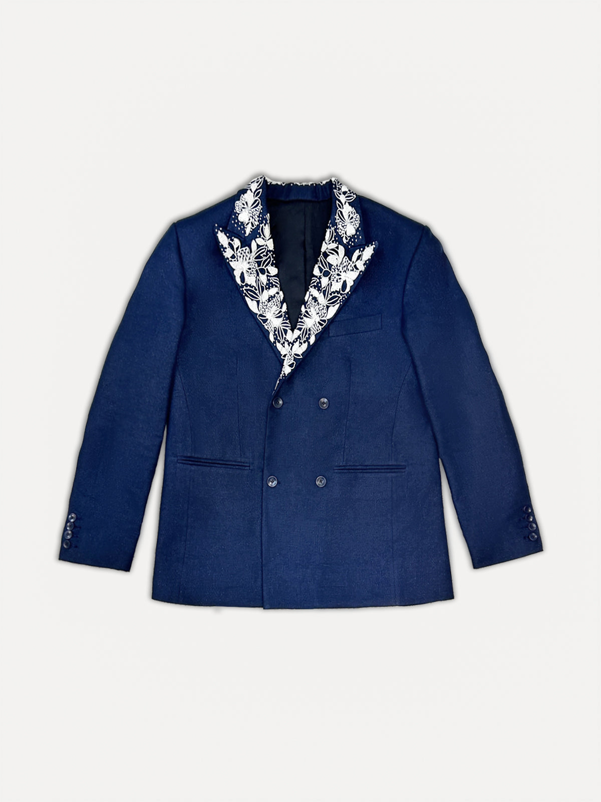 Blue blazer with a patterned collar on a light gray background