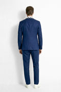 Man wearing a blue suit on a white background