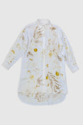 A white long-sleeve button-up shirt with a gold and yellow botanical and floral print, displayed flat against a light gray background.