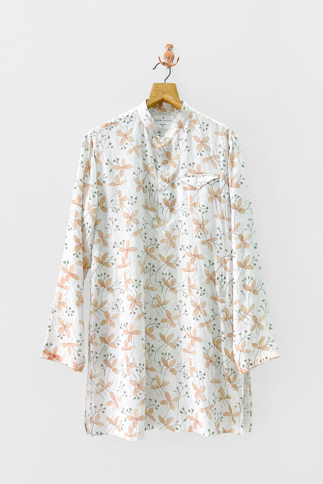 Indian ethnic white printed kurta hanging