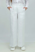 A pair of black wide-leg trousers with a mid-rise waist, front buttons, and a relaxed fit. The trousers are fully lined and have a hook and bar closure at the waistband with an adjustable elastic belt.