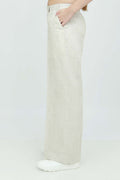 A pair of beige wide-leg trousers with a mid-rise waist, front buttons, and a relaxed fit. The trousers are fully lined and have a hook and bar closure at the waistband with an adjustable elastic belt.