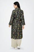 A woman standing against a white background, wearing a floral print long sleeve kurta with a mandarin collar and a V-shaped neck.