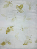 Hemp-cotton fabric hand eco-printed with Bel patra leaves, full spread showing repeated leaf prints