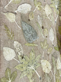 Brown hemp-cotton fabric with eco-printed leaf impressions, wider view