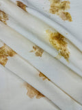 Hemp-cotton eco-printed fabric draped in soft diagonal folds