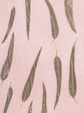 Peach linen hand eco-printed with eucalyptus leaves, close view of the print