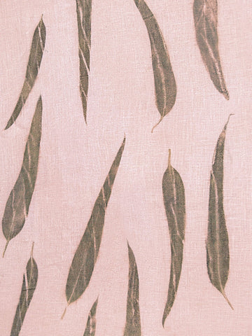 Peach linen hand eco-printed with eucalyptus leaves, close view of the print