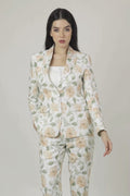 Woman wearing a floral suit on a white background
